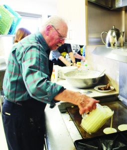 The Pancake suppers started early. The Caledon Seniors' Centre in Bolton was a busy place at lunch time with their annual event. Henry Naag was among those busy in the kitchen.
