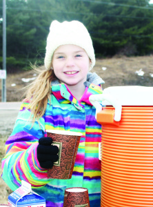 SELLING HOT CHOCOLATE FOR THE CAUSE Students at Macville Public School have been very busy working to raise money in their Spread the Net effort, aimed at buying bed nets for children in Africa to help protect them from mosquitoes carrying malaria. Grade 3 student Hannah Brooksbank came up with the idea of selling hot chocolate, and she was out Sunday afternoon doing a brisk business at Palgrave Pond. Photo by Bill Rea