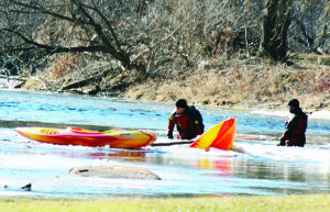 POLICE STILL SEARCHING FOR MISSING KAYAKER Members of the OPP Under Water Search and Recovery Unit are still looking for a kayaker who went missing on the Credit River near Terra Cotta Sunday. Police report they were told about two kayaks found on the ice in the hamlet at about 3 p.m. The body of a woman, said to be in her early 20s, was pulled from the water down stream from where the kayaks were found, and police were busy Monday looking for her male companion. As of 5 p.m., they had not found anything. Photo by Bill Rea