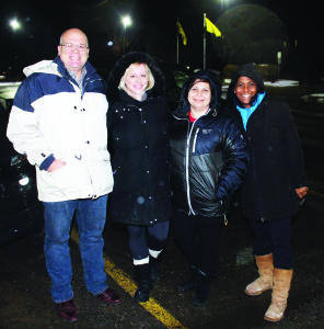 Mayor Allan Thompson, Councillor Jennifer Innis, Anita Stellinga, vice-president of community investment for United Way of Peel Region, and Councillor Annette Groves spent Friday night sleeping in their cars at Town Hall as part of the Longest Night. Photo by Bill Rea