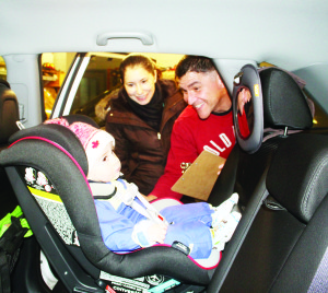 CHILD CAR SEAT CLINIC Caledon OPP Auxiliary officers recently held the latest in their series of Child Car Seat Clinics. Auxiliary Constable Danny Gallant was showing Katherine Simonetti of Bolton how to adjust the seat for her 15-month-old son Matthew. The next clinic will be this coming Tuesday (March 29) from 6:30 to 9:30 p.m. at Bolton Fire Hall, 28 Ann St. It will be by appointment only. Call 905-584-2241 for more information or to book an appointment. Photo by Bill Rea