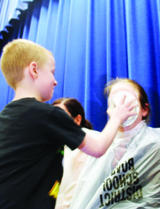 Grade 2 student Alex Smith had a fun target when it came to throwing pies in faces. He drew Principal Kelly Kawabe. Alex didn't get in any trouble.