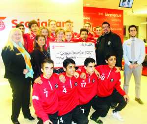 Members of the Caledon Bulldogs U17 were at the Scotiabank branch at Mayfield and Bramalea Roads recently to receive a contribution from the Team Community Fund. The team, along with Coach Maurizio Marini, accepted the cheque for $5,000 from Manager of Customer Service Alice Pinder, Customer Service Supervisor Toni Rosati, Branch Manager Mollie Cavan and Financial Advisor James Oliveira. Photo by Bill Rea