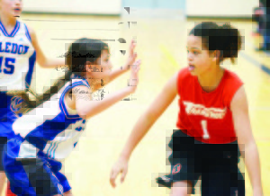 A Caledon Cougars player defends against a Transway Basketball ball carrier in the championship game of the under-11 Ontario Cup in London. Photo courtesy of Ontario Basketball