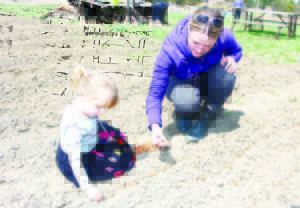 There was lots of work being done, like planting. Kristina Rettie of Hockley Valley and her daughter Sloan, 4, were busy planting onions.