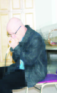 Nelson Sleno demonstrated his skill with a harmonica when he addressed the Bolton Parkinson's Support Group late last month. Photos by Bill Rea