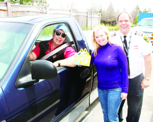 Councillor Jennifer Innis and Fire Chief David Forfar were collecting contributions at the Caledon village McDonalds from people like Inglewood area resident Joe Metcalfs. Photos by Bill Rea