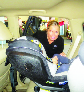 CHILD CAR SEAT CLINIC HELD IN BOLTON Caledon OPP Auxiliary officers recently held the latest in their series of Child Car Seat Clinics. Peel Regional Police Auxiliary Constable Laura Peel was checking out the adjustment of this sea, occupied by Ryan Swaine, 2, of Bradford. The next clinic will be May 24 from 6:30 to 9:30 p.m. at Bolton Fire Hall, 28 Ann St. It will be by appointment only. Call 905-584-2241 for more information or to book an appointment. Photo by Bill Rea