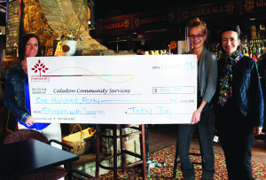 DONATION TO CCS The Toby Jug in Bolton recently held a Shopping with Sangria's event with local vendors selling their wares. Manager Carolyn Banks recently presented the proceeds of the event to Caledon Community Services. The $140 was received by Fundraising Associate Nicole Dumanski and Fundraising Events Specialist Shona Lauzon. The money will be used to send local children to camp this summer. Photo by Bill Rea