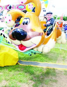 There was lots of great fun to be had on the rides in the Midway, as Landon Anderson, 3, of Orangeville found out.