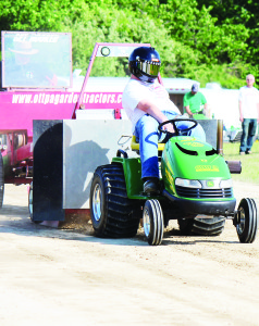 There were lots of people out to watch the Lawn and Garden Tractor Pull Saturday afternoon. Matthew Boyes of Inglewood was competing in the Pro-Stock class, and he pulled sled 229.26 feet.