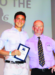 Dave Kurzinger presented John Milkovich with the award as Junior Boys' Athlete of the year.