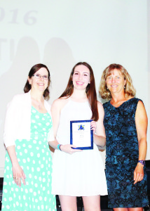 Julia D'Amico and Christine Huet presented the Merit Award to Kaitlyn Walsh. Huet called her a very organized “taskmaster.”