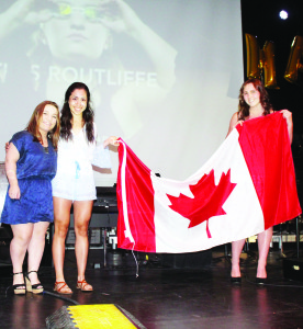 Rachel Chan-Yaneff and Ashley Riddall made a special presentation to swimmer Tess Routliffe, who is expected to be a medal contender in the upcoming Paralympics.
