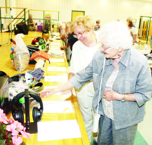 The event included a silent auction. Marilyn Benson and Marjorie Pratt of Brampton were looking over some of the items. Photos by Bill Rea