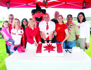 The Canada Day celebrations started early and went all day Friday at Downey's Farm Caledon's Strawberry Festival. Mayor Allan Thompson officiated at this cake cutting, accompanied by Councillor Jennifer Innis and her daughter Lyra; Councillor Gord McClure; Melissa Maodus, who was representing Dufferin-Caledon MP David Tilson; Dufferin-Caledon MPP Sylvia Jones; Dudley, the Downey's mascot, John and Darlene Downey; and Councillors Nick deBoer and Johanna Downey. Photos by Bill Rea