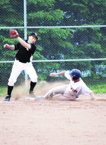Brett Chater of the Bolton Brewers slides safely into third against the Martingrove White Sox. Photo by Jake Courtepatte