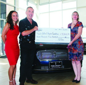 BETHELL GETS CONTRIBUTION FROM FINES There were lots of people who benefited from the Driven to Give event held in June at Fines Ford Lincoln. Many got the chance to test drive a 2016 Lincoln product, and Lincoln Canada agreed to donate $50 to a worthy cause for everyone who took advantage of the offer, up to a maximum of $7,500. In fact, they got 169 to test drive the Lincolns. “We're very, very exceedingly proud,” Bob Fines declared. He was joined Friday by Daniela Mosca, business development manager with Lincoln Canada, in presenting the cheque to Julie Hymers, fund raising manager with the Bethell Hospice Foundation. Photo by Bill Rea