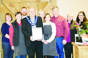 Mayor Allan Thompson and Councillor Barb Shaughnessy were flanked by Headwaters Tourism Executive Director Michele Harris, Don McArthur, Melinda McArthur, Gord McArthur, Ontario Farm Fresh Marketing Association President Leslie Forsythe and Barb Smith of Foodland Ontario at the recent grand opening of Heatherlea Farm Shoppe. Submitted photo