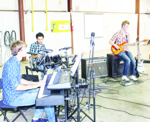 Music in the hangar last Thursday was provided by Kontakt, consisting of Matt Boettger, Mitch Greenham and Andrew Boettger. Photos by Bill Rea