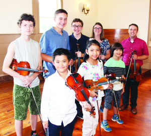Friday afternoon featured a Young Artists Concert: Suzuki Violin Play Down. Zachary Ebin (far right) is seen here with some of the performers, including (back row) Lucas Hartwig, Kai Rousseau, Damiano Perrella, Carmen Evans, (front row) Ethan Mei, Alondra Saint Amour and Dylan Hartwig. Photos by Bill Rea