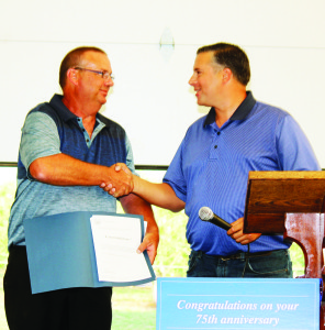 Brampton Councillor Michael Palleschi was representing Regional Chair Frank Dale as he presented a certificate to Federation President Keith Garbutt.