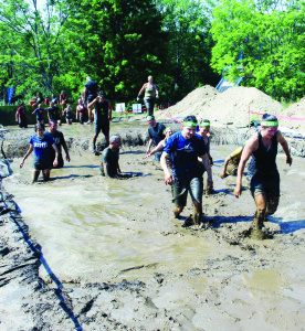 here were plenty of people taking part in good, clean fun, or at least good fun Saturday at Albion Hills Conservation Area. They were taking part in the Mud Heroes event, running an obstacle course filled with lots of mud.