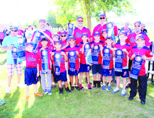 The victorious players on the major rookie championship team were presented Sunday with copies of the banner which has been risen at North Hill Park. Photos by Bill Rea