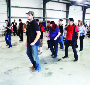 A number of people got up to join New Age Country Entertainment in their line-dancing demonstration.