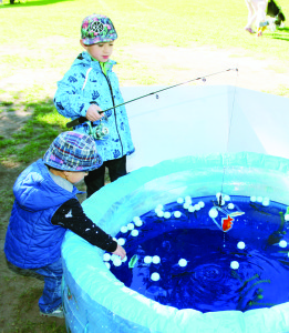 There were fun and educational games for the kids. Aleks Strasberg, 2, of Vaughan and his brother Asher, 7, got the chance to learn something about invasive species at this fish pond game.