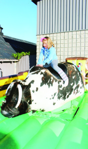 The mechanical bull always provides lots of fun at the fair, even if it's hard to stay on. That's what Izabella Adamusiak, 8, of King City learned.
