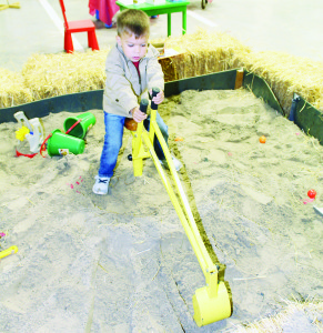 There was lots of fun to be had in Kids Land. Mason Melas, 3, of Bolton was having a good time in the sand pit.