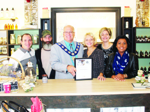 DRAKE APOTHECARY OPENS AT NEW LOCATION Drake Apothecary in Bolton has moved, but not too far. The official opening of the new location, at 19 Queen St. North, recently took place. Proprietor Michelle Marino was accompanied by staff members Rob Spence and Alisa Fotopoulos as Mayor Allan Thompson handled to opening, accompanied by Councillors Rob Mezzapelli and Annette Groves. Photo by Bill Rea