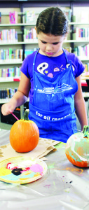 It was a good time to decorate pumpkins, as Sophie Insley, 7, of Bolton demonstrated.