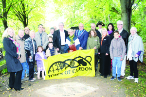 Author and historian Ken Weber was surrounded by family, friends and Town councillors Saturday as his stone on Caledon's Walk of Fame was unveiled.