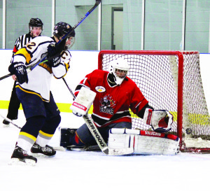 Caledon captain Nicholas McNutt gets a shot in close against the Orillia Terriers. The Golden Hawks fell 6-3 to the Terriers Saturday. Photo by Jake Courtepatte