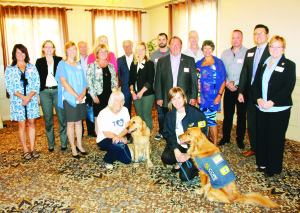 ROTARY THANKS SPONSORS It was a recently a night for members of the Rotary Club of Palgrave to thank their sponsors for their assistance over the year. It was also a time to learn some facts about COPE Service Dogs, which are trained to help people with various disabilities. Brenda Lue was there with Luna, a golden retriever who's almost two, and Darlene Vaughan was with Luna's sister Brandy. Photo by Bill Rea