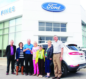 CAR PRESENTED IN DRAW SUPPORTING BETHELL Several people were out at Fines Ford Lincoln in Bolton last Wednesday for the presentation of the grand prize in the Bethell Hospice Foundation Caring for Our Community Lottery. Forks of the Credit area resident Peter Olar was accompanied by his wife Margaret as he accepted the keys to this 2016 Lincoln MKC SUV from Jeannette Vanden Heuvel, director of development for the foundation. Also on hand were Bob Fines, and Hospice volunteers Margalith Estierhuizen, Carol Walker and Maurice Smith. Olar said he bought the winning ticket at the draft banquet of the Caledon Oldies Hockey League, in which he's a goalie. Bill Doherty sold him the ticket. “I bought my ticket at the right time, I guess,” he said. Vanden Heuvel said they sold more than $3,000 tickets. “We managed to meet our goal,” she commented. “We're just thrilled.” Photo by Bill Rea