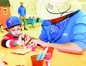 There were crafts for the young folks to work on. Maddox DaSilva, 3, of Caledon was getting help from his father Mathew and Ryan Thompson as he was making a turkey out of a paper bag and other things.