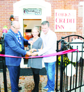 Mayor Allan Thompson was on hand to help out with the recent opening of Forks of the Credit Inn in Cataract. Photo by Bill Rea