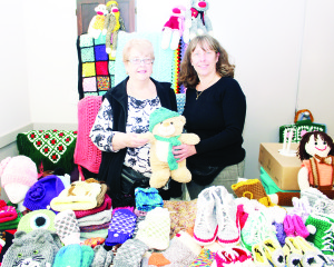 Former Bolton resident Darlene Garratt, who now lives in Wasaga Beach, was assisted by her mother Drene in displaying a collection of knitted goods and stuffed animals.