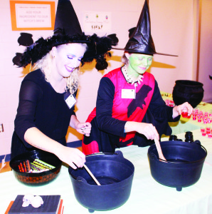 Program Leaders Lexa Castellan and Megan McCabe were serving up their form of Witch's Brew Friday night.