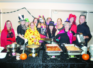 SPOOKY SPAGHETTI DINNER DRAWS CROWDS It was a spooky scene around the Caledon Community Complex Saturday night as the Caledon East Revitalization Committee held their annual Spooky Spaghetti Dinner. Committee members taking part in the festivities included Terri Boorne, Sherrie Kirkpatrick, Patti-Anne Fitzpatrick, Tina Naack, Cheryl Robb, Jacqui Viaene, Mollie Cavan, Adrianna Roche, Ann Currie, Dorothy Mazeau, Andrea Prieur and Chris Merkley. Photo by Bill Rea