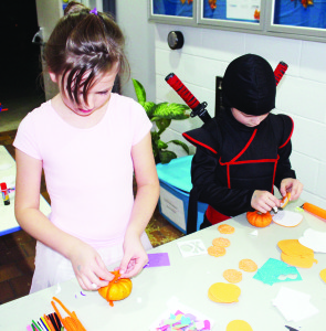 Mad Scientist Mathew Nelso was showing some of his magic to Natalia and Larysa Demkowycz of Caledon East while their father Walter watched.