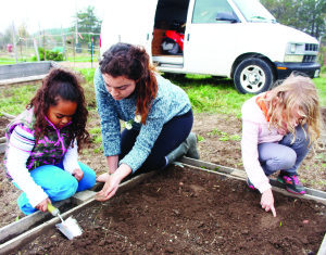 KIDS' FARMING CLUB WRAPS UP The last day for the Kids' Farming Club at the Albion Hills Community Farm took place recently. Farm Leader Adrienne Sultana was assisting Makayla Cherry, 6, of Palgrave and Emma Van Lim Berg, 7, of the Palgrave area with their work. The program has been so successful, there are plans to run a spring session starting in May. More information and registration information will be on the Farm's website at www.albionhillscommunityfarm.org          Photo by Bill Rea