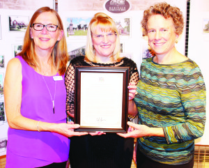 Dufferin-Caledon MPP Sylvia Jones presented a framed copy of the tribute she delivered in the legislature last week to Heritage Caledon Chair Joanne Crease and Caledon's Heritage Resource Officer Sally Drummond.