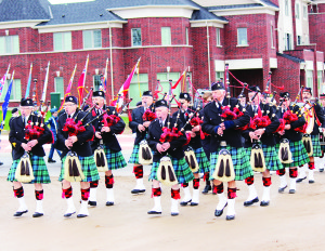 Members of the Sandhill Pipe Band were at the head of the parade to Town Hall. Photos by Bill Rea