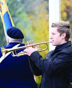 Robert F. Hall Catholic Secondary School student Peter Zarzecki played Last Post.