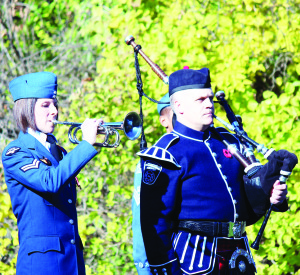 Corporal Christine Savoie of the Canadian Forces School of Aerospace Technology and Engineering played the Last Post and Reveille at Sunday's service in Bolton, while Captain Don Rea of Caledon Fire and Emergency Services played Lament. Photos by Bill Rea