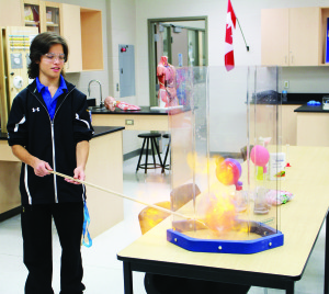 There was lots of interesting things to see last Thursday night as St. Michael Catholic Secondary School in Bolton hosted Grade 8 students planning to attend next year and their families for a taste of what high school life is like. Grade 12 student Miguel Solano was busy igniting these balloons filled with hydrogen.